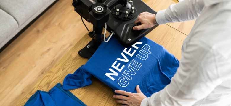 design on a blue T-shirt using custom printing in KL